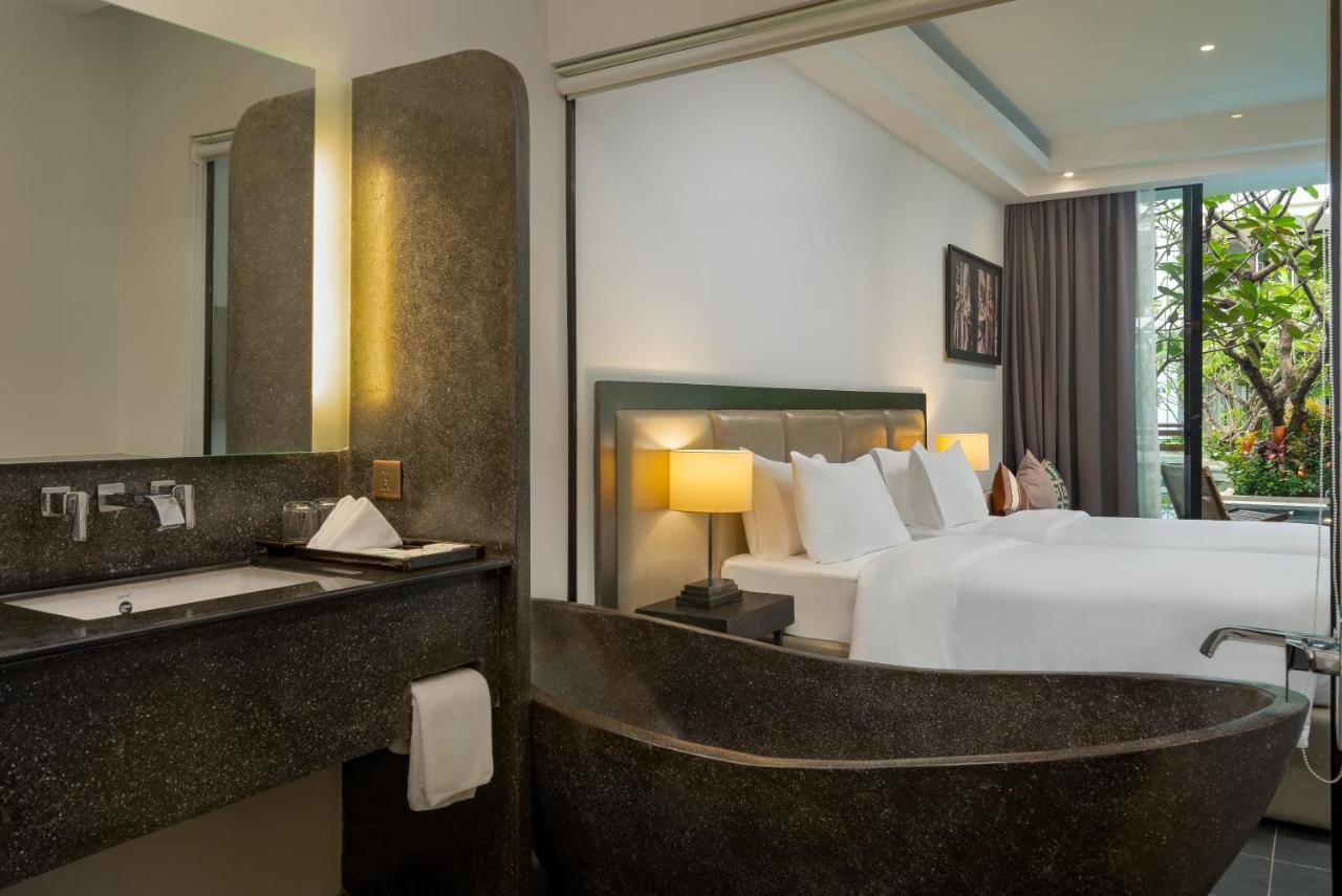 Eightfold Urban Resort Siem Reap Bagian luar foto Deluxe Room
