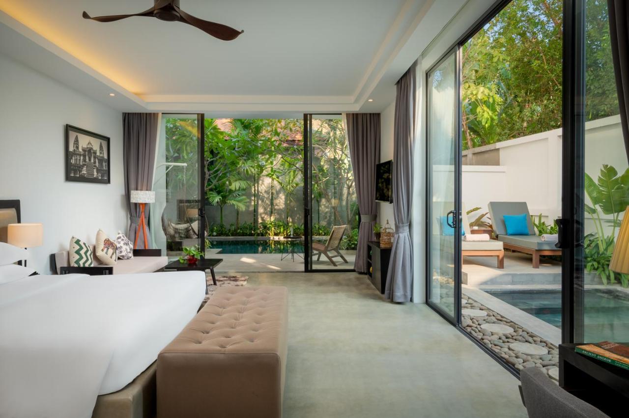 Eightfold Urban Resort Siem Reap Bagian luar foto A pool villa at The Village Phuket