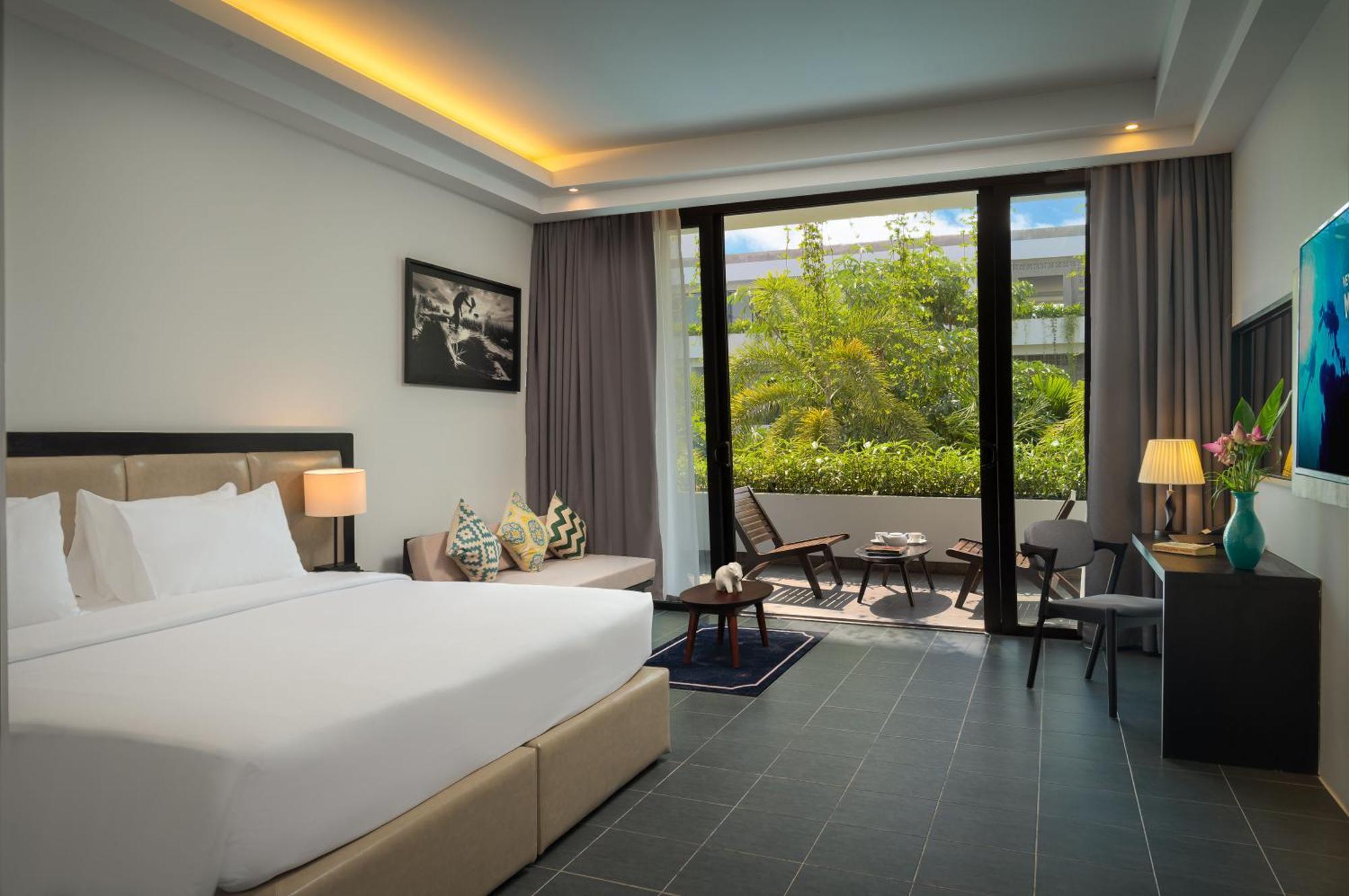 Eightfold Urban Resort Siem Reap Bagian luar foto Deluxe Room