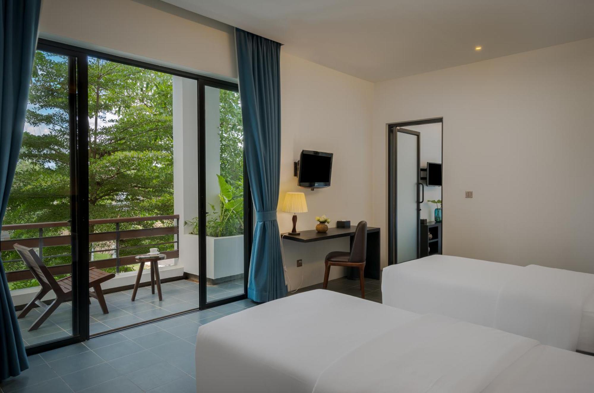 Eightfold Urban Resort Siem Reap Ruang foto Deluxe Room